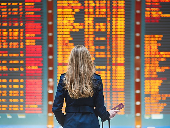 Woman flying airport_Crop